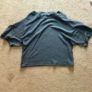 Sweater type with slits down the arm